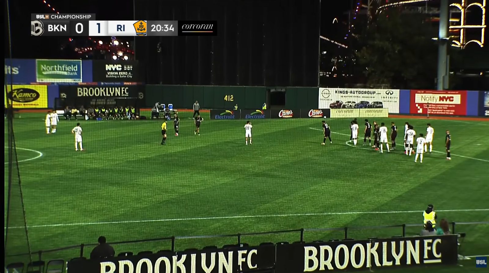 Brooklyn FC vs Rhode Island FC broadcast shot through the netting